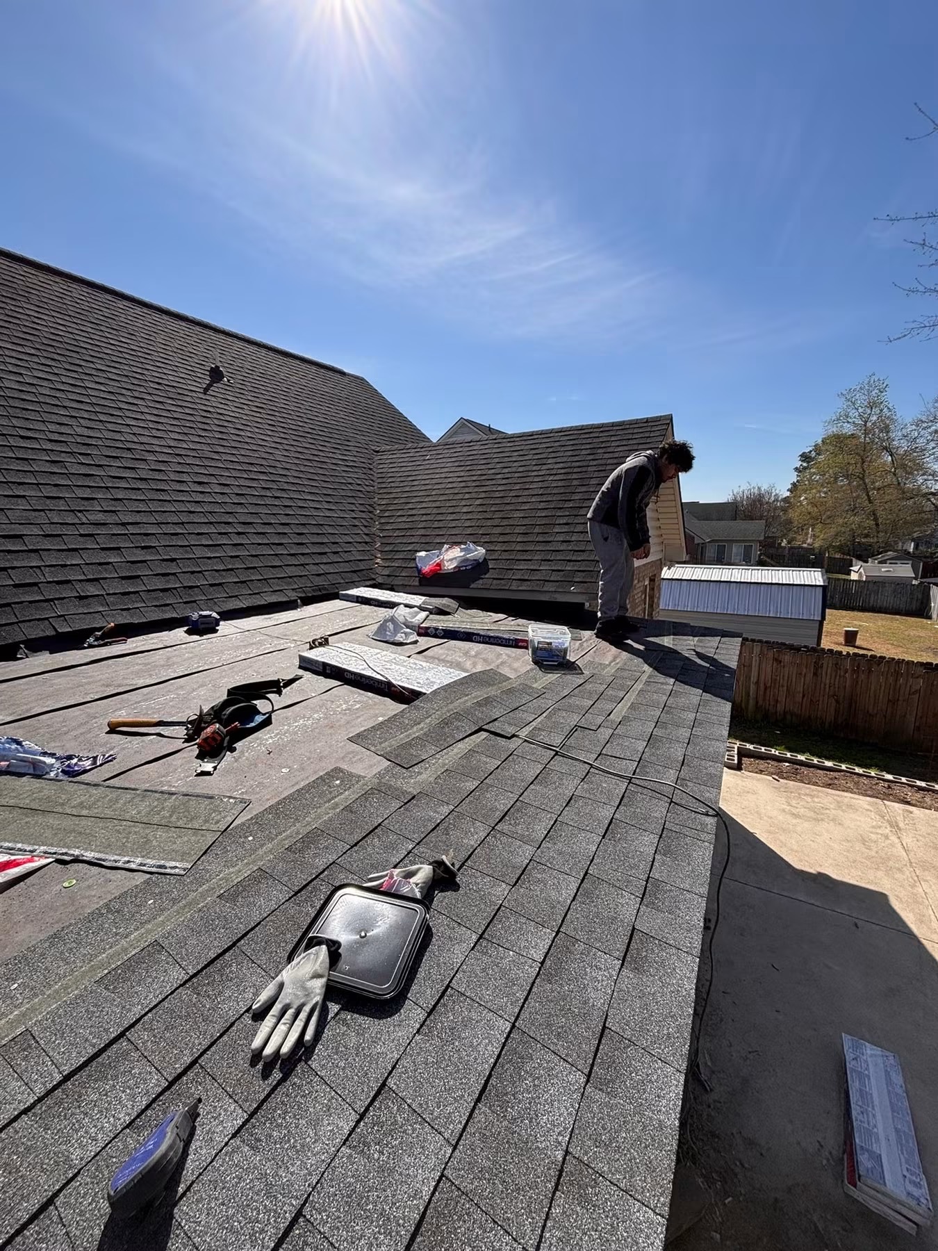 New architectural shingle roof replacement in progress