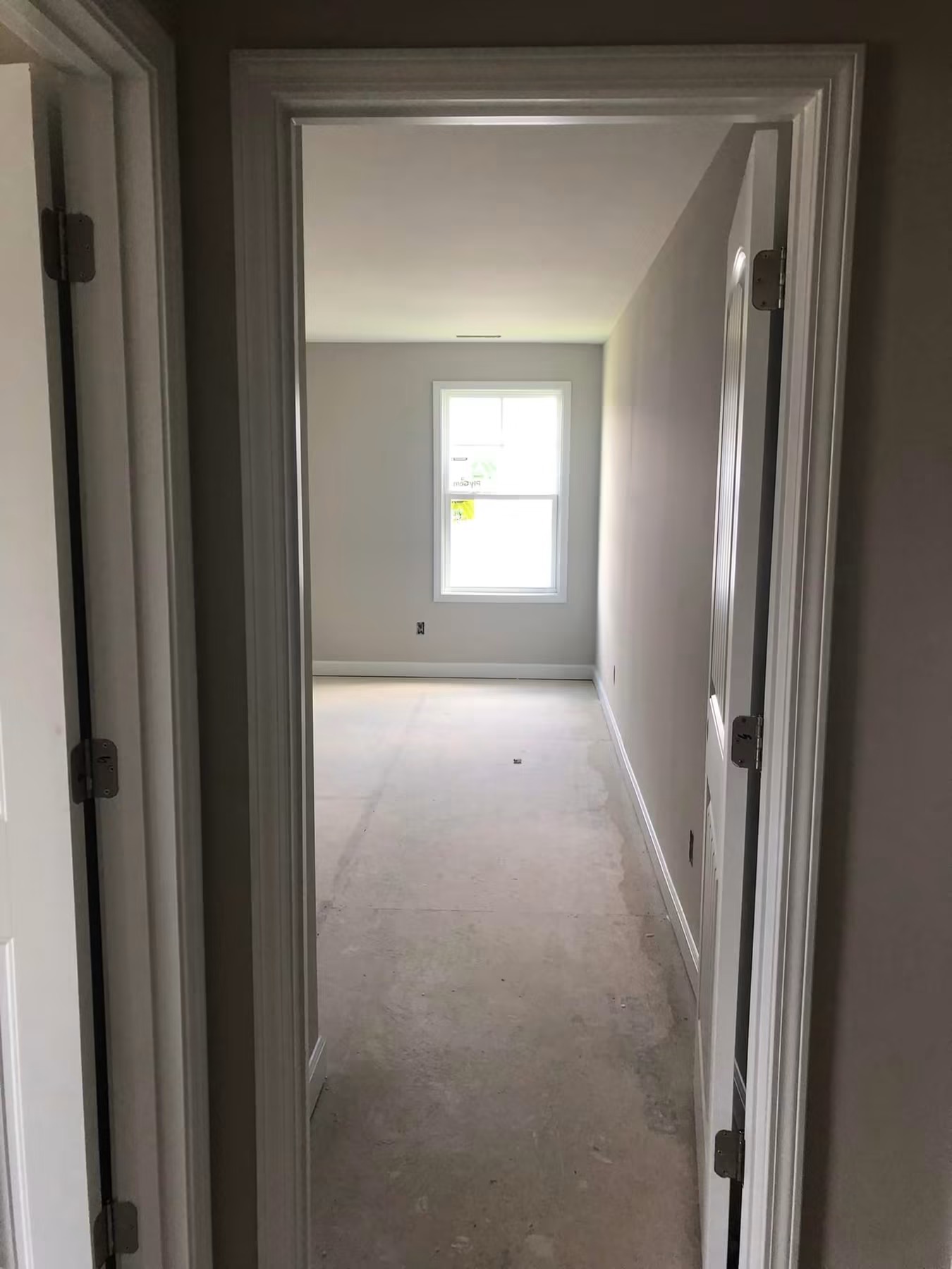 Interior doorway with new casing, baseboard and fresh paint