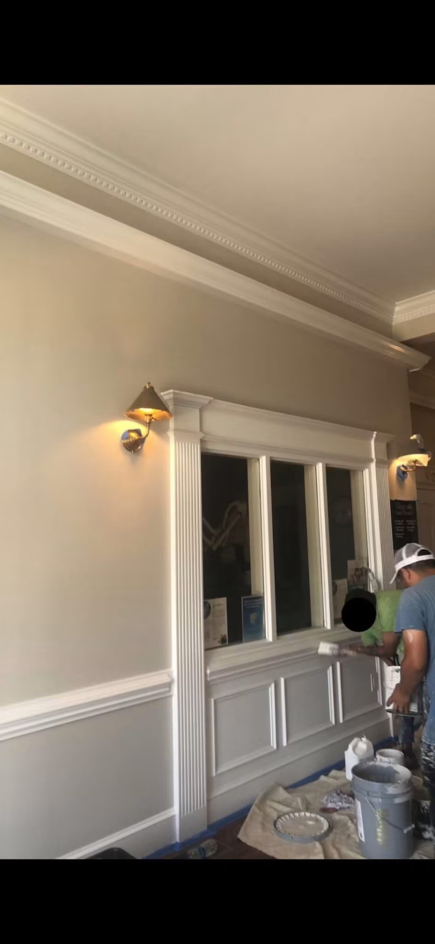 Custom wainscoting and trim work with fresh interior paint