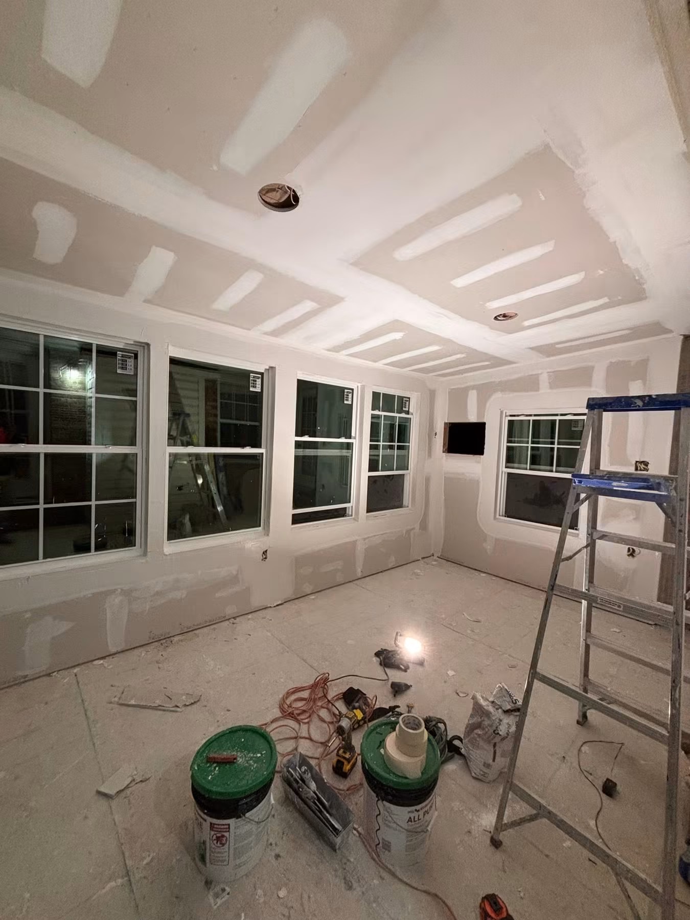 Drywall hung and finished on a new sunroom addition